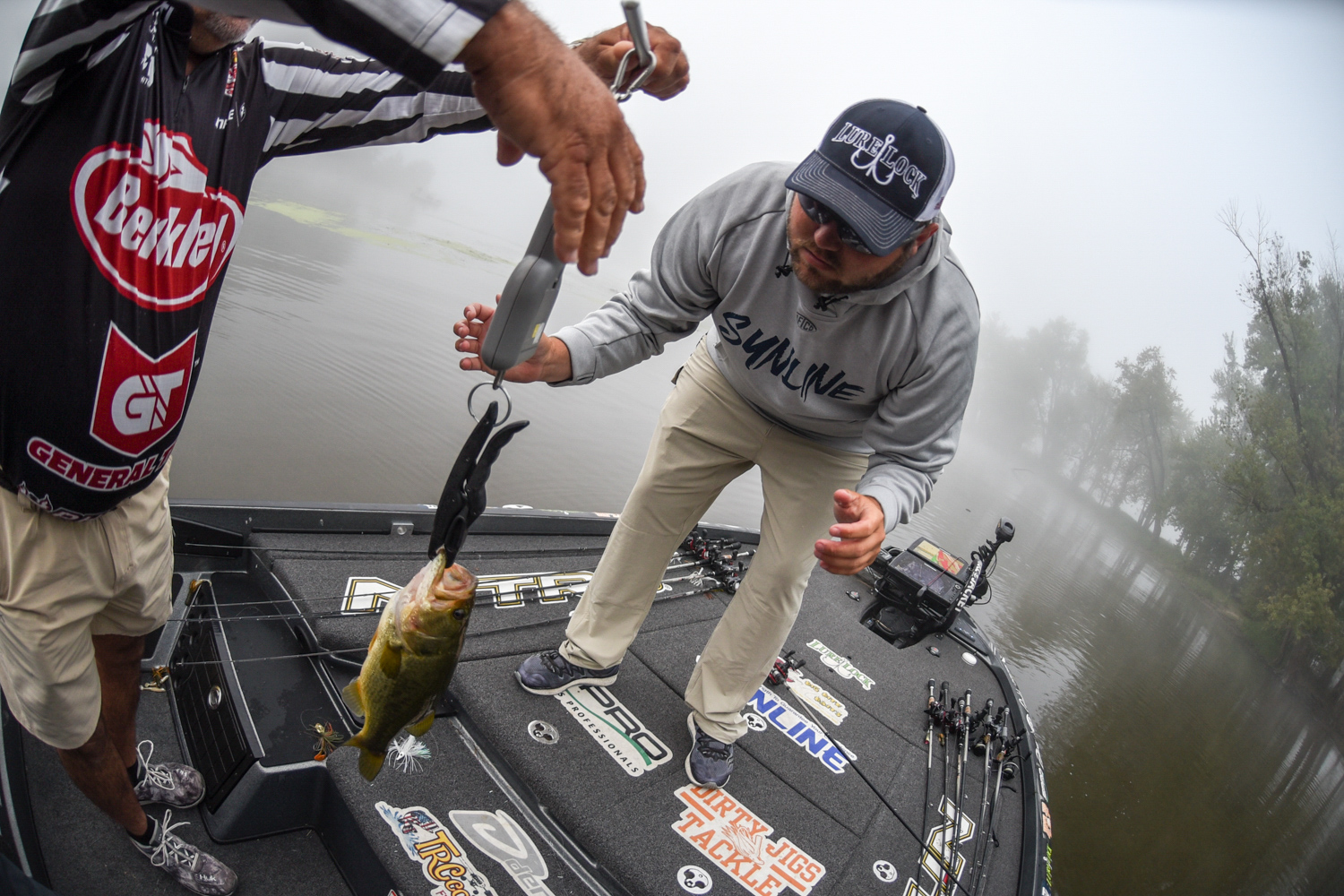 Michael Neal weighs his catch. Photo by Garrick Dixon