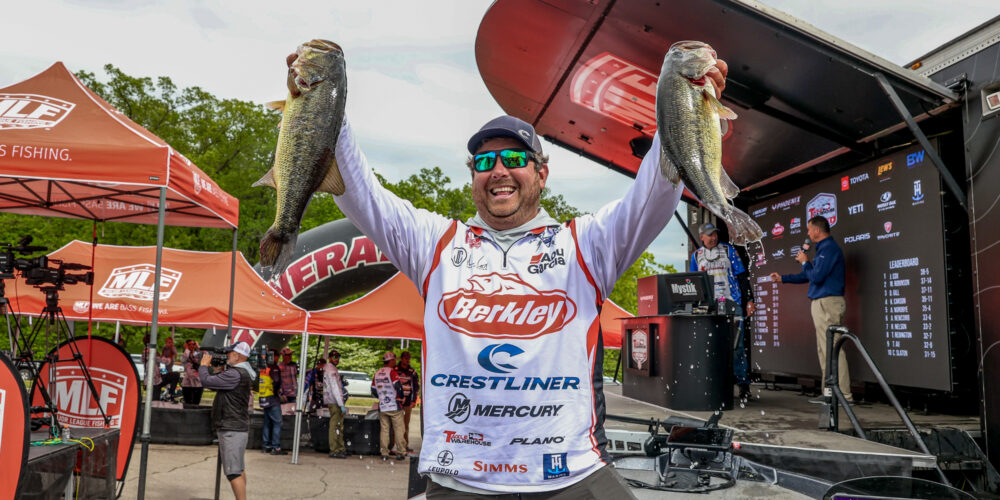 Image for Cox on top after Day 2 at Lake of the Ozarks, the kids are hot on his heels