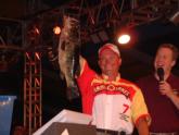 Pro Jimmi Leuthner of Vernon, Vt., proudly displays his 8-pound, 2-ounce largemouth bass. Leuthner was in third place after the semifinals.