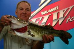 Doug Caldwell of Kane, Penn., used a 12-pound, 8-ounce catch to capture the overall lead in the Co-angler Division after the first day of competition. Caldwell is pictured with a 7-pound, 4-ounce largemouth, the largest fish caught in the Co-angler Division during today