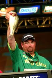 Dan Morehead holds up part of his winning stringer en route to a first-place finish on Beaver Lake. Morehead