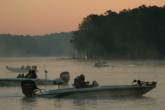 With mist rising off the lake, anglers get ready for takeoff.