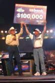 Allen Hayes of Moody, Ala., claimed the $100,000 check, handed to him by Ranger Boats founder Forrest L. Wood, for winning by a mere 2 ounces.