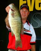 Pro Kenneth Plencner of South Bend, Ind., tied Al Gagliarducci's big-bass mark with this 6-pound, 1-ounce smallmouth of his own.