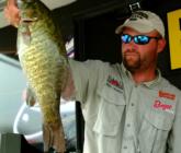 Michael Trickler of Waterloo, N.Y., caught the big-bass winner on the pro side Thursday - this nice 5-pound, 15-ounce smallmouth - and took fourth with an opening-round total of 36-4.