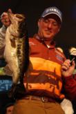Kelly Jordon of Mineola, Texas, holds up part of his winning 30-pound, 13-ounce stringer during the 2005 FLW Tour event on Okeechobee.