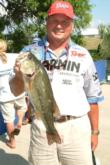 Pro Rob Kilby holds up his biggest bass from day one.