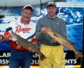 Glenn Chenier and Douglas Goaley show off their day-two catch from Green Bay.