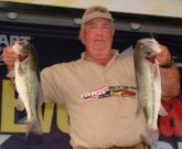 Co-angler leader Chuck Rounds has a 1-pound, 9-ounce advantage heading into the final day.