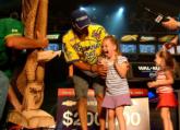 Iaconelli's daughters get a kick out of the winner's eagle woodcarving presented by Poulan.
