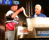 Pro Jarrad Fluekiger weighs in using the new water weigh-in system.