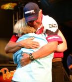 Wal-Mart FLW Walleye Tour champion Robert Lampman embraces his wife, Colleen, after his dramatic victory.
