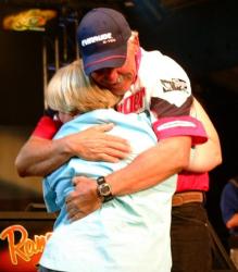 Wal-Mart FLW Walleye Tour champion Robert Lampman embraces his wife, Colleen, after his dramatic victory.