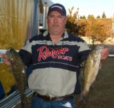 Mark Guin grabbed the day-one co-angler lead with a three-bass catch that weighed 7-13.
