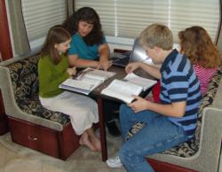 Jimmye Sue Jones conducts a homeschooling session aboard the family's brand-new motor home.
