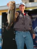 Pro Arnie Lane of Lakeland, Fla., shows off his 8-5 bass. He finished third with a two-day total of 27-15