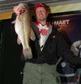 Pro Kevin Stowers of Gainesville, Ga., shows off his 7-pounder which helped him finish fourth with a two-day total of 12 pounds, 12 ounces.