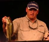 Co-angler leader Michael Wright weighs in a 2-pound, 3-ouncer from his day-one limit of 8 pounds, 15 ounces.