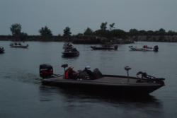 Anglers make one last pass in the confines of Gordon Park Marina before heading out onto the open waters of Lake Erie.