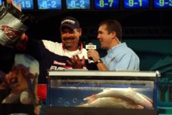 Pro Rick Olson has a laugh after leading weighmaster Kevin Hunt to believe he had a fourth fish to round out his limit on the final day of championship action, but his bag was empty.
