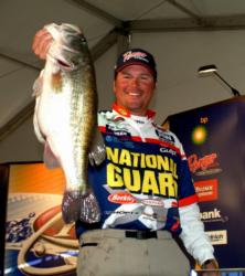 Pro Scott Martin shows off the biggest bass of the tournament thus far. This Lake Travis monster weighed 8 pounds, 12 ounces.
