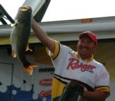 Current points leader and fifth-place finisher Stephen Johnston displays the 9-pounder he caught on day four.
