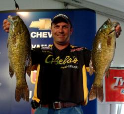 Michigan pro Scott Dobson caught five giant smallmouths Friday to earn $10,000.