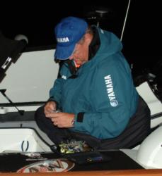 Pro leader Mark Davis ties on spinnerbaits shortly before the day-four takeoff.