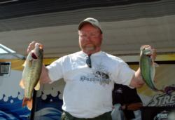 Co-angler Ron Abbott of Lafayette, Ind., is in second place with 12 pounds, 8 ounces.