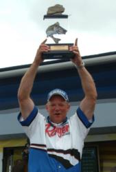 Steve Vande Mark holds up his trophy for winning the Bays de Noc Walleye Tour qualifier.
