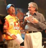 Scott Suggs gets a little faint when FLW Outdoors Chairman Irwin Jacobs hands him an actual check totaling $1 million.