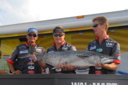 Left to right, Ellis Phillips, Steve Miller and Mark Gerrald of Team McNeill hold up their tournament-leading fish weighing 38 pounds, 10 ounces at the FLW Kingfish Tour event in Atlantic Beach.