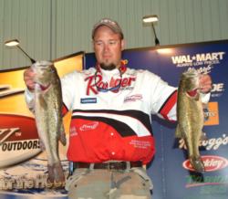 Pro Derek Hicks shows off a 4-pound, 7-ounce bass he caught on day two of the Stren Series Championship. Hicks