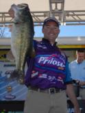 Caraballo's best: Prilosec co-angler Jess Caraballo shows off the biggest bass he's ever caught, a 10-2 from Lake Amistad on day two.