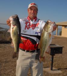 Pro Greg Bohannan showing off the fish that earned Mark Rose a berth into the Forrest Wood Cup.