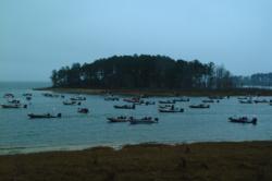 Boats idle near an island on Sam Rayburn Reservoir as they await the green light for day-three takeoff.