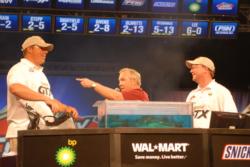 Charlie Evans calls out Bryan Talmadge as the co-angler champion by tie-breaker due to Talmadge's higher round-one weight.