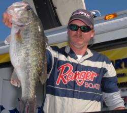 Mike Jackson shows off an 8-4 lunker that helped him into third place.