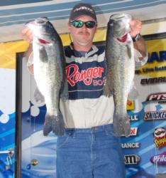 Mike Jackson of San Mateo, Fla., caught three big females off one bed to move into second place with 45-15