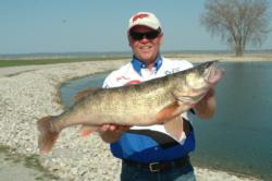 John Swanstrom holds up a 12-pound Lake Erie walleye he caught Friday.