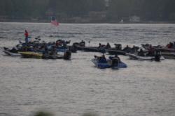 Boats idle up to the check out boat on day one of the FLW Tour event on Lake Norman.