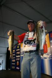 In a lake where small, finesse rigs rule, Mike Surman threw a 6-inch worm and worked it aggressively on his way to a 7th-place finish on day two.