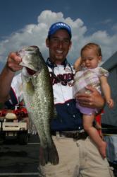 Even with her dad Ott Defoe weighing a 4-pound, 12-ounce bass, 11-month-old Abbie stole the show.