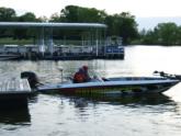 Ramie Colson Jr. pilots the National Guard boat onto Kentucky Lake.