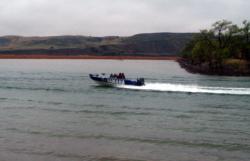 A Yamaha-wrapped Walleye Tour boat makes its way toward the main channel of the Missouri River.