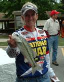 Co-angler Pamela Bolton shows off her 13-ounce spotted bass.