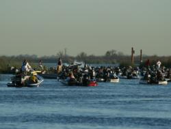 Tournament boats file into the creek mouth for day-three check out.
