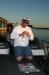 Pro leader Mike Andrews rigs a hefty swimbait in hopes of scoring a big bite early. 