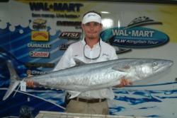 Capt. David Logan of Logan's Run shows off his catch of 40 pounds, 14 ounces. Logan's Run qualified for the finals of the Sarasota FLW Kingfish Tour event in second place.
