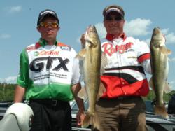 Co-angler Nate Brunz and pro Scott Steil hold up their two overs from Saturday.